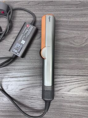 Dyson straightener in silver and copper accents